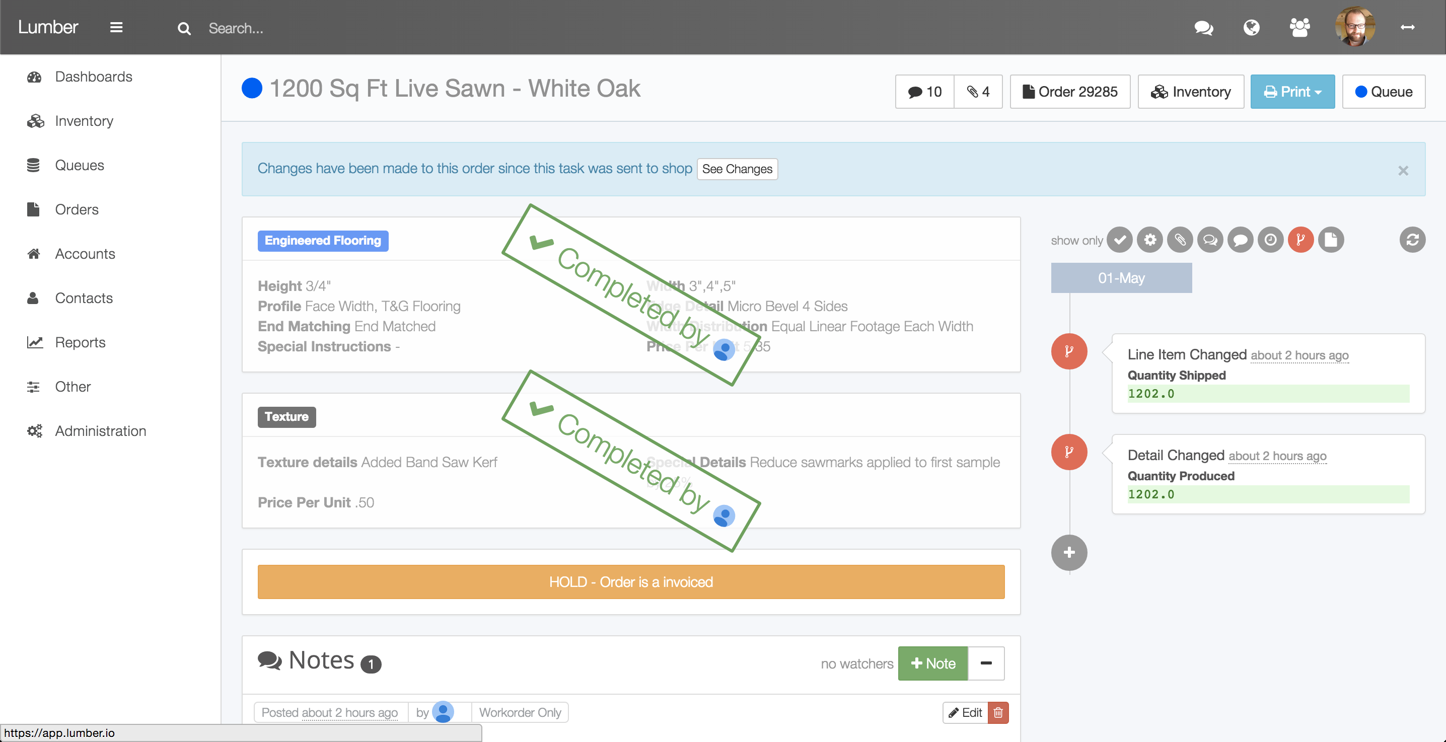 Lumber order screen showing a change-order alert, highlighted changes, and department details